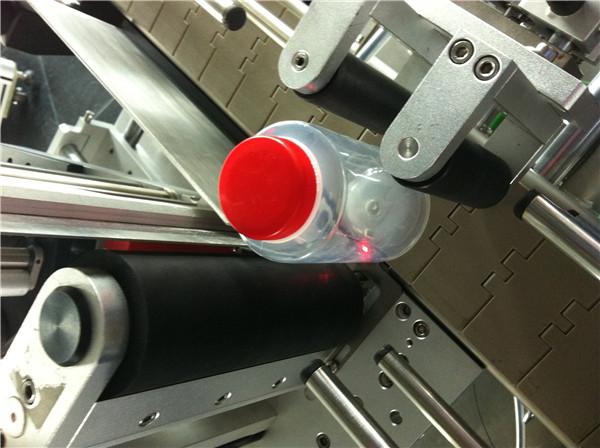 පව්පව් / ගුවා රවුම් බෝතල් ස්ටිකර් ලේබල් කිරීමේ යන්ත්‍රය බීම ක්ෂේත්‍රය සඳහා