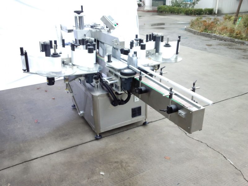 ඕවල්, වටකුරු, ජලජ බෝතල් ස්ථාවර සැපයුම්කරු සඳහා ඉදිරිපස සහ පසුපස පැත්ත සහිත චයිනා ස්වයංක්‍රීය ද්වි පාර්ශ්වික ස්ටිකර් ලේබල් යන්ත්‍රය