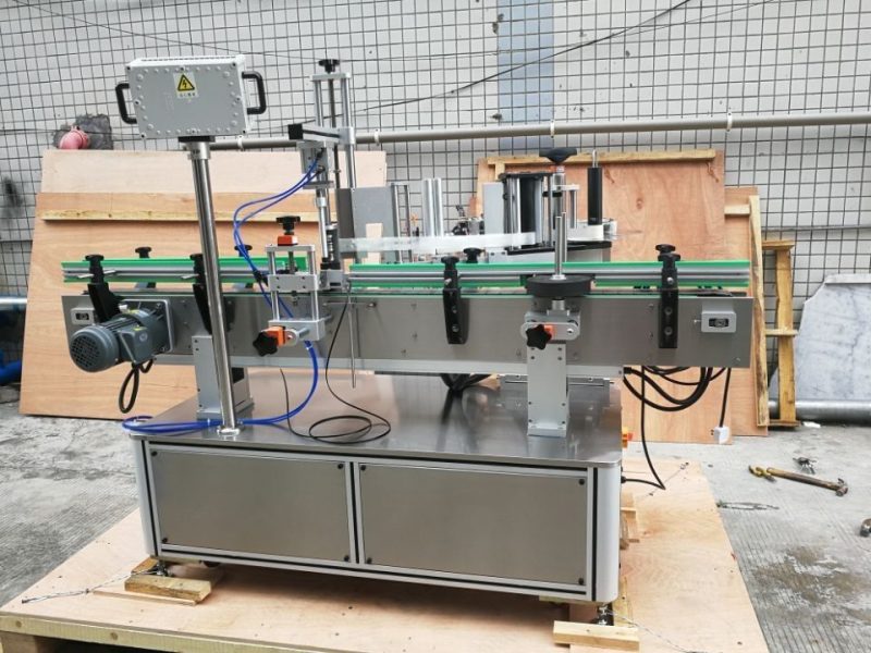 චයිනා ස්ටෑන්ඩර්ඩ් ස්වයංක්‍රීය වටකුරු බෝතල් ලේබල් කිරීමේ යන්ත්‍ර ඉදිරිපස සහ පසුපස සැපයුම්කරු